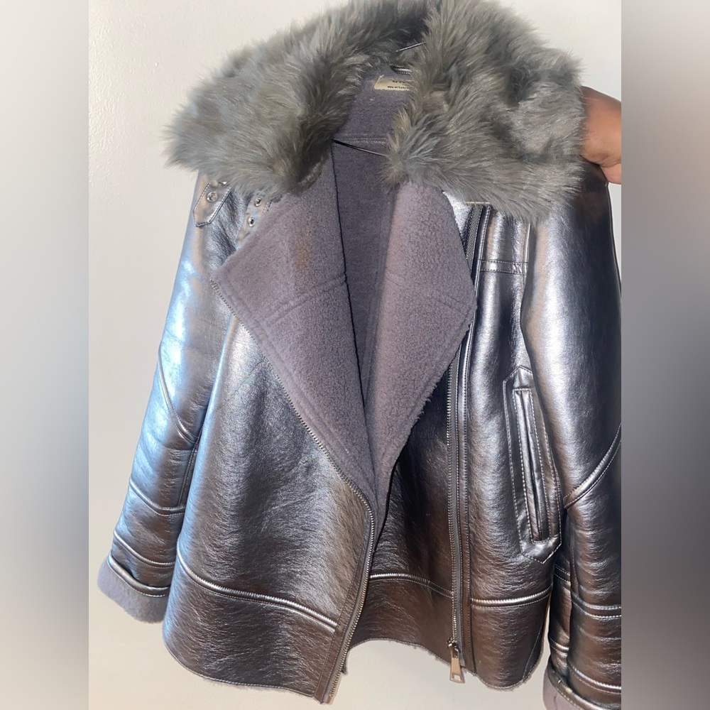 Pewter / silver Moto jacket / shearling with fur inside . Very warm with fur